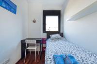 Postel nebo postele na pokoji v ubytování Jie Apartment