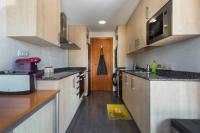 Kuchyň nebo kuchyňský kout v ubytování Jie Apartment