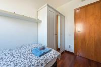 Postel nebo postele na pokoji v ubytování Jie Apartment