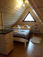 Posteľ alebo postele v izbe v ubytovaní Apartamenty u Bacy