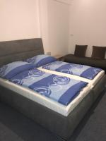 Łóżko lub łóżka w pokoju w obiekcie Penzión Vilo