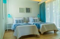 Posteľ alebo postele v izbe v ubytovaní Rethymno Villas