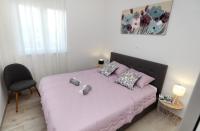 Postel nebo postele na pokoji v ubytování Apartment Little Marijeta
