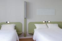 Cama o camas de una habitación en Ibis Budget Braga Centro