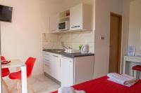 Kuchyňa alebo kuchynka v ubytovaní Apartments Tabain