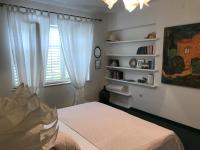 Posteľ alebo postele v izbe v ubytovaní Apartment and Rooms Lapad