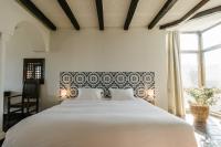 Cama o camas de una habitación en Hotel Castillo de Monda
