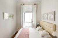 Postel nebo postele na pokoji v ubytování Apartamentos Alcalá