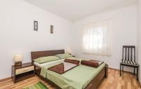 Postel nebo postele na pokoji v ubytování Apartments Duplic