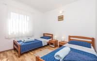 Postel nebo postele na pokoji v ubytování Apartments Duplic