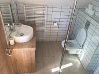 A bathroom at Sipos Borház és Vendégház
