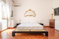 A bed or beds in a room at Cristina Rossi Bed&Breakfast