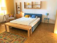 Postel nebo postele na pokoji v ubytování Vintage Design Apartment