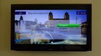 Televízia a/alebo spoločenská miestnosť v ubytovaní Centrum Hotel