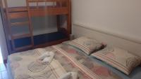 Posteľ alebo postele v izbe v ubytovaní Apartmani Lupi 2 M&S