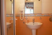 Koupelna v ubytování Hotel Kamelia
