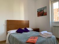 A bed or beds in a room at Alba Renueva 6