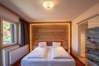 Łóżko lub łóżka w pokoju w obiekcie Hölzl Bed & Breakfast