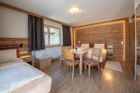 Łóżko lub łóżka w pokoju w obiekcie Hölzl Bed & Breakfast