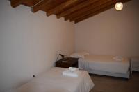 Postel nebo postele na pokoji v ubytování Serenity Luxury Villa, Skiathos