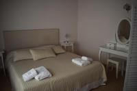 Postel nebo postele na pokoji v ubytování Serenity Luxury Villa, Skiathos