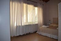 Postel nebo postele na pokoji v ubytování Serenity Luxury Villa, Skiathos
