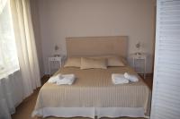 Postel nebo postele na pokoji v ubytování Serenity Luxury Villa, Skiathos