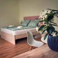 Posteľ alebo postele v izbe v ubytovaní Moment Apartments