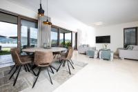 A television and/or entertainment centre at Linde Villas