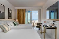 Posteľ alebo postele v izbe v ubytovaní Savoia Hotel Rimini