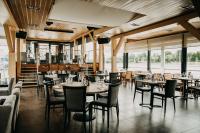 A restaurant or other place to eat at Vogue Boat Apartments