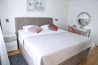 Postel nebo postele na pokoji v ubytování Apartment Villa Grga