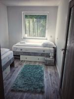 Posteľ alebo postele v izbe v ubytovaní Moment Apartments