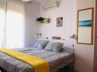 Posteľ alebo postele v izbe v ubytovaní La Costa Penthouse