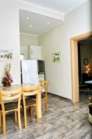 Kuchyň nebo kuchyňský kout v ubytování Cristi Apartments