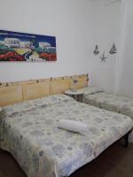 A bed or beds in a room at Casa Mariagrazia
