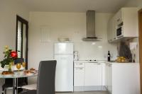 Kuchyňa alebo kuchynka v ubytovaní Apartments Tabain