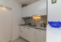 Kuchyňa alebo kuchynka v ubytovaní Apartment M&J Supetar