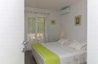 Posteľ alebo postele v izbe v ubytovaní Apartment M&J Supetar