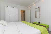 Posteľ alebo postele v izbe v ubytovaní Apartment M&J Supetar
