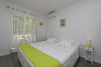 Posteľ alebo postele v izbe v ubytovaní Apartment M&J Supetar