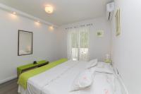 Posteľ alebo postele v izbe v ubytovaní Apartment M&J Supetar