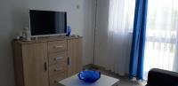 TV a/nebo společenská místnost v ubytování Apartments Max