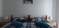 Postel nebo postele na pokoji v ubytování Apartments Max