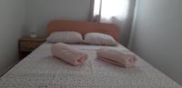 Postel nebo postele na pokoji v ubytování Apartments Max