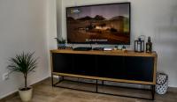 TV a/nebo společenská místnost v ubytování Holiday house ISA