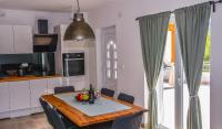 Kuchyň nebo kuchyňský kout v ubytování Holiday house ISA