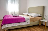 Postel nebo postele na pokoji v ubytování Holiday house ISA