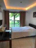 Postel nebo postele na pokoji v ubytování Laguna Beach Resort 2 Jomtien Beach