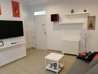 Telewizja i/lub zestaw kina domowego w obiekcie Apartamentos Playa Benitez